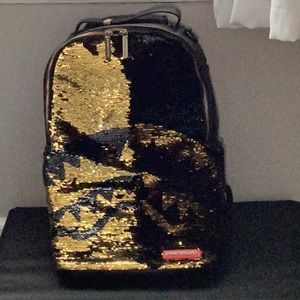 Spray ground backpack
